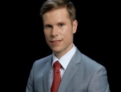 Dr.iur. Artūrs  Caics